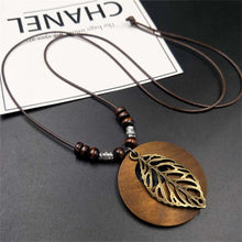 Load image into Gallery viewer, Vintage Wooden Owl Leaf Pendant Necklaces Boho Ethnic Style Metal Hollow leaves Necklaces Long Wax Rope Chain For Women Gifts