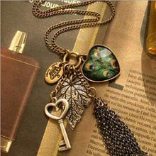 Load image into Gallery viewer, High Quality Retro Peacock Feather key Necklace