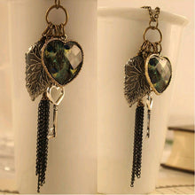 Load image into Gallery viewer, High Quality Retro Peacock Feather key Necklace