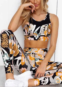 Two-piece yoga suit with printed cropped waistcoat and leggings
