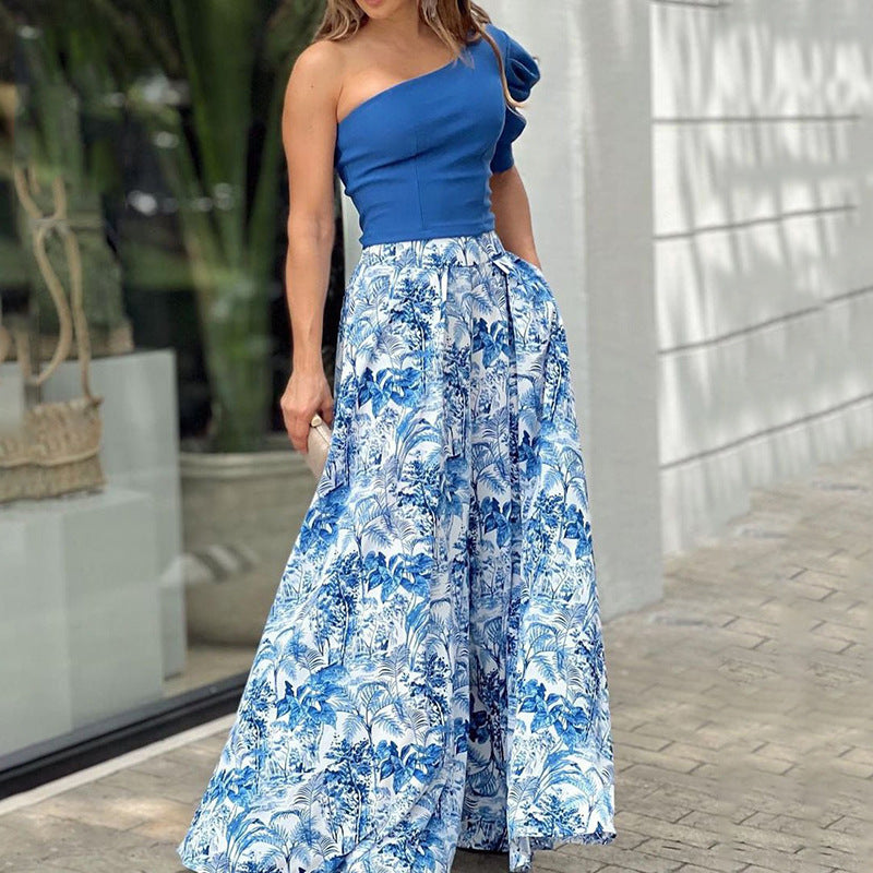 Two-piece set of personalized one-shoulder sleeve tops and printed skirts