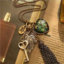 Load image into Gallery viewer, High Quality Retro Peacock Feather key Necklace
